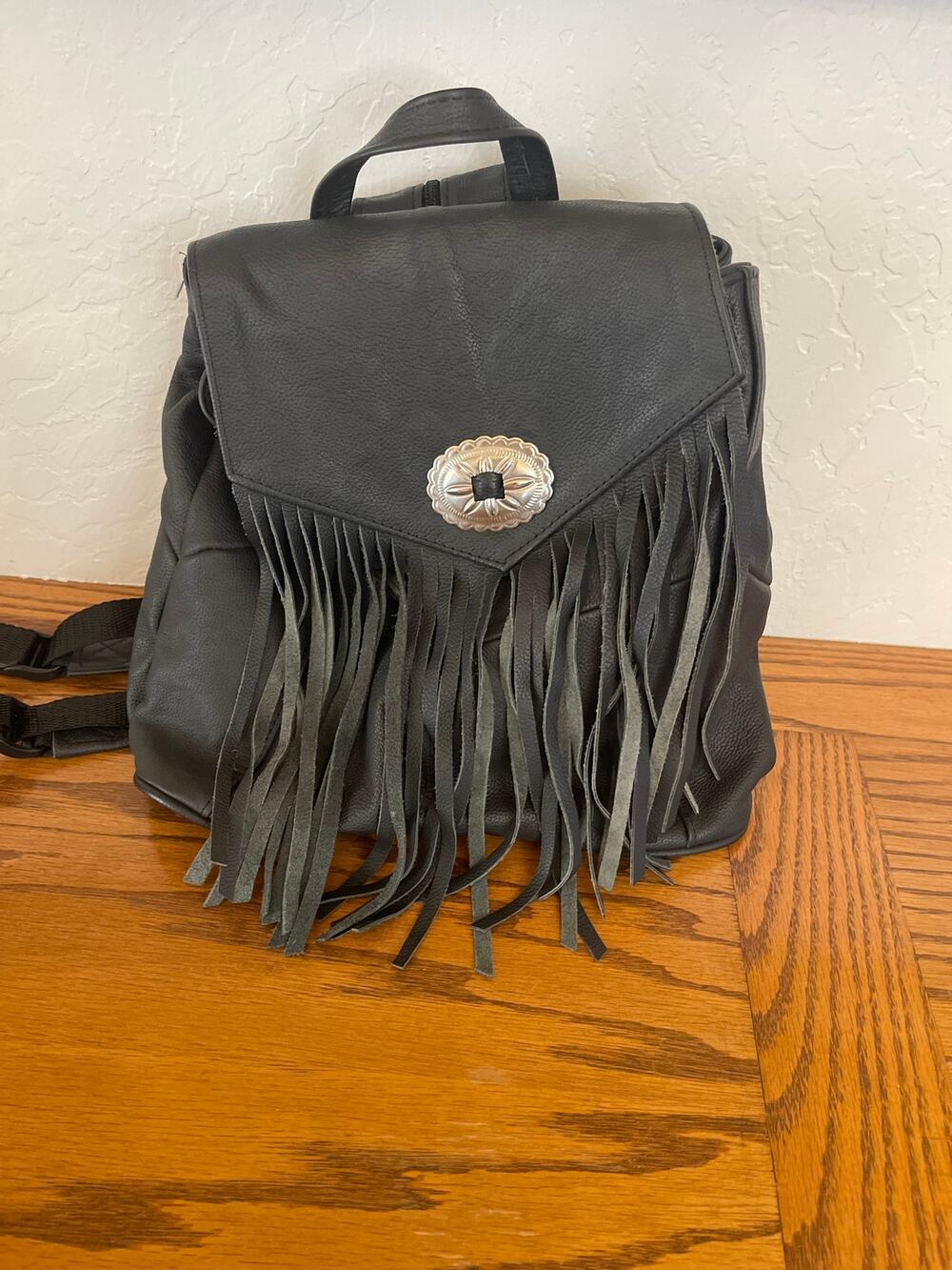 Leather western fringe Conche backpack